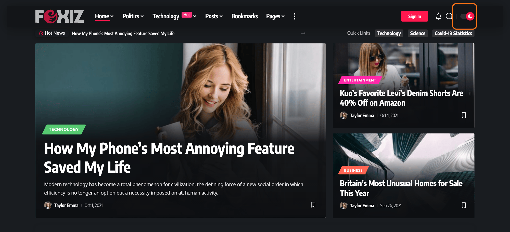 The Foxiz Default demo in dark mode after the toggle (outlined in orange) is switched: dark background, light text and the dark logo.