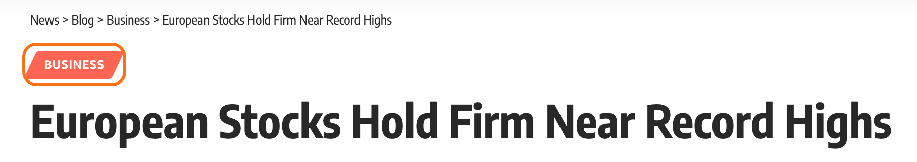 The top of a single post on the Default demo: the breadcrumb, then the Business category label outlined in orange above the title European Stocks Hold Firm Near Record Highs